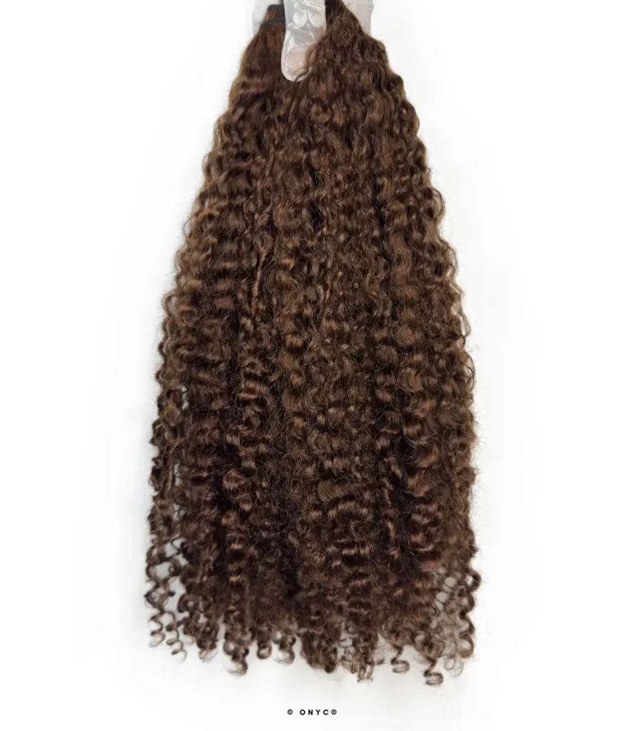 Indian Kinky Curly Hair Bundles ONYC Loose Kinks ClassiQUE Collection. Double drawn kinky curly hair in color 4 chocolate brown from the Double drawn Indian kinky curly bundle – ONYC® Loose Kinks™ ClassiQUE™, showcasing Indian Kinky Curly Hair Bundles with a realistic 3C curl pattern hair and kinky curly hair bundles natural texture. This Kinky curly double drawn human hair is super double drawn, well made, and crafted from Virgin Indian 3C curly hair as part of the ONYC® kinky curly hair extensions range, where all ONYC kinky textures, including popular 3B3C, offer the best kinky curly human hair weave. The Thick kinky curly Indian hair bundles feature Loose kinky curls Indian hair, 3C textured curly hair extensions, and Textured Curly Hair Extensions ideal for a full kinky curly sew-in hair that delivers kinky curly hair for volume and voluminous curly hair styles. This high-density kinky curly hair is frizz-friendly kinky curly bundles, natural-looking, tangle free that does not shed!, soft, long-lasting, and worth the investment. Made from Raw Cuticle Hair, Virgin hair, and real human hair, these Kinky Curly Human Hair Bundles, Afro Kinky Curly Human Hair bundles, and Human Hair Curly Weave are premium, lightweight, durable, and perfect as the best African American curly hair extensions from a Black-owned human hair extensions brand. Available in 14 in to 18, 18 in to 24 in, over 24 in, and under 14, these Indian curly bundles with 3C texture come in long or short lengths, sold online or in store, with local pickup in Washington DC and Maryland, plus fast shipping USA and free shipping.