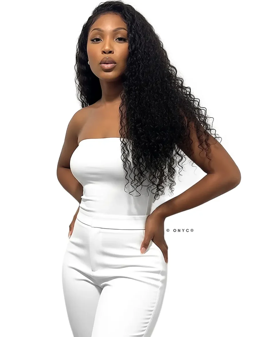 Model wearing ONYC Deep Curly Human Hair Bundles 3B Curly Weave Weft – Curly Addiction™, featuring Deep Curly Human Hair with lush ringlet curls that frame the face beautifully. The style captures luxurious, Natural-looking, Voluminous, and Full-bodied texture, representing Best deep curly human hair for black hair. The model’s stunning look highlights Virgin Deep Curly Human Hair Extensions Weft crafted from Mongolian Virgin Hair and Raw Cuticle Hair, ensuring finest Quality, Soft, Reusable, and Tangle Free that Does Not Shed! This photo perfectly showcases Deep Curly Hair with Closure, deep curly human hair weft, and Deep curly hair extensions for black hair—ideal for protective styles, heat free hair, and natural hair extensions for black hair. The ONYC Curly Addiction™ Deep Curly Hair Bundles are Premium, Thick, Durable, and Worth the investment, earning praise in ONYC Curly Addiction™ Deep Curly Hair Reviews as the Best Deep Curly Human Hair Bundles for Black Women. Available as 3B Deep Curly Virgin Hair Weft Bundles, ONYC Deep Curly Weave Extensions Human Hair, and Deep Curly Human Hair Extensions Sew-In, this collection includes Double Drawn Deep Curly Weave Bundles, Best 100% deep curly bundles, and Affordable Deep Curly Human Hair Weave Bundles Online for USA, Maryland, and Washington DC. Perfect for those looking to Buy Virgin Deep Curly Human Hair Bundles Online USA or shop Deep Curly Human Hair Bundles Near Me, with Fast shipping, free shipping, Local Pickup, and Various Style Options. The model’s look embodies ONYC Deep Curly Weft Hair Extensions — high-quality, Long-Lasting, Human-hair, and Virgin hair that defines the ONYC Deep Curly Human Hair Weft as the Best Natural Hair Extensions and true Virgin Deep Curly Hair Bundles Maryland Pickup experience.